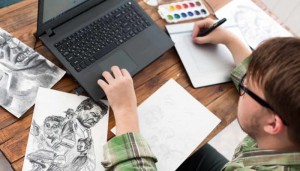 Artist drawing Sketch on Graphic Tablet Top View