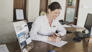 Receptionist working at the front desk