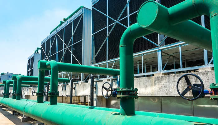 Sets of cooling towers in data center building.