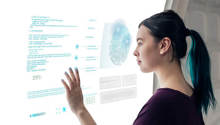 Girl coding on a interactive screen